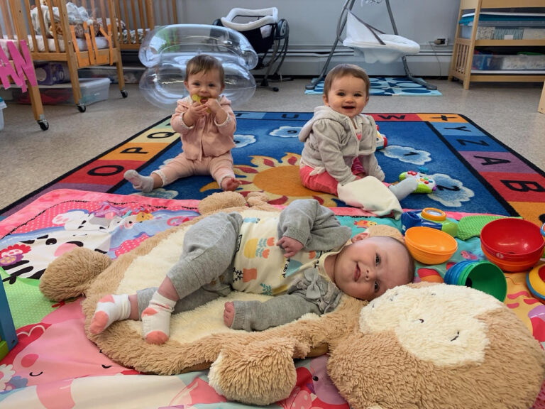 Playing infants at Little Tides Nursery